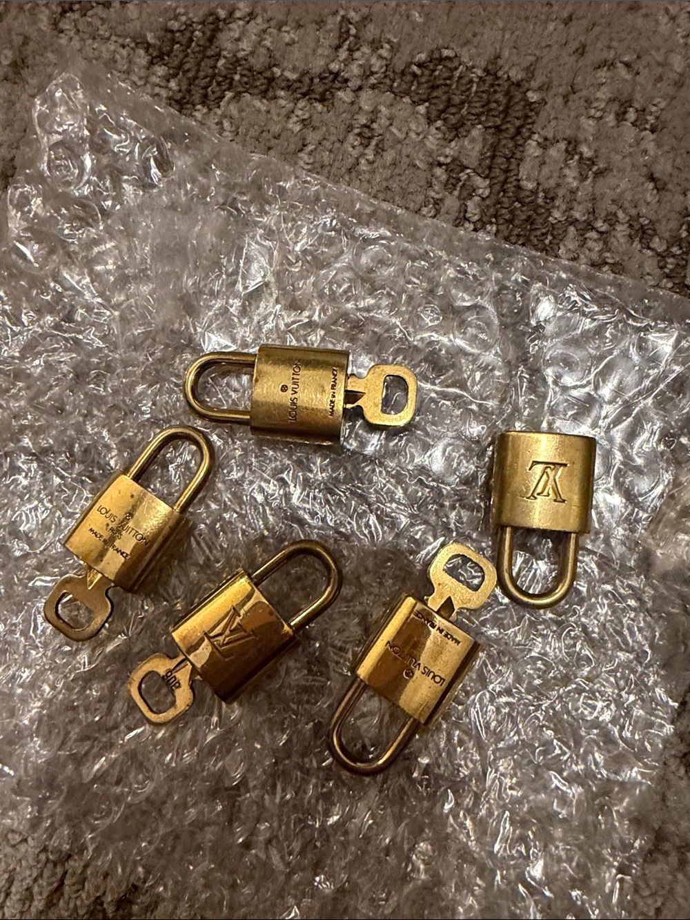 Louis Vuitton Brass-Tone Padlock Set with Keys - Gold Finish